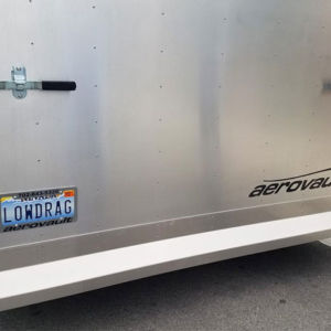 Aerovault designer Peter Brock loved seeing this plate when this Aerovault owner pulled up to the shop one day. Aong with his smile he pointed out it could actually have said, "NODRAG". Low Drag Aerovault license plate