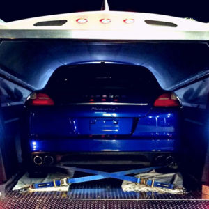 The Aerovault isn’t just an aerodynamic, great handling, lightweight trailer, it’s a source of ‘delight’. This photo was achieved by having the front interior light on and the back interior light off so this striking blue Panamera was backlight. Then the running lights and brake lights were on while having the light switch flipped that turns on the back-up lights manually for rear lighting when you need it. All of the lighting on the Aerovaults reflects beautifully in the aluminum whether it’s the interior or on the tailgate. Isn’t this scene a delight? Panamera rear with lights