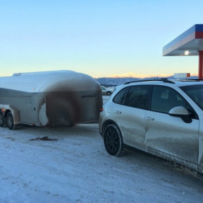 Cayenne Towing Enclosed Aerovault Trailer In The Snow